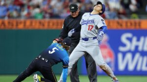 Dodgers' undefeated start comes to an end as Phillies' J.T. Realmuto extinguishes late comeback attempt