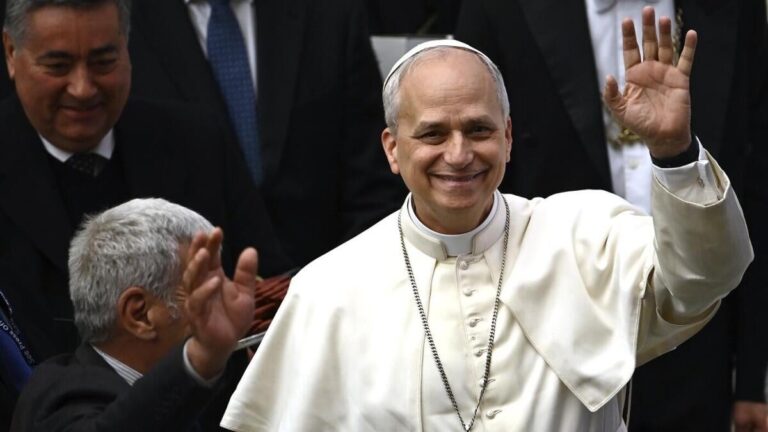 Pope Leo XIV asked fan 'White Sox or Cubs?' before autographing baseball at the Vatican