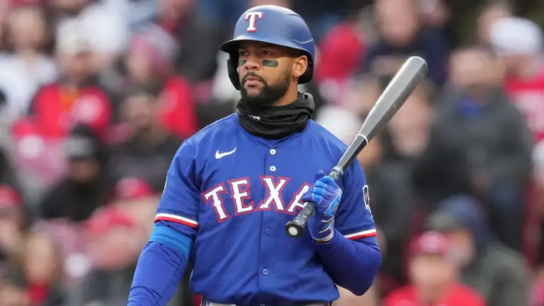 Texas Rangers fire coach, designate center fielder for assignment in offensive shake-up